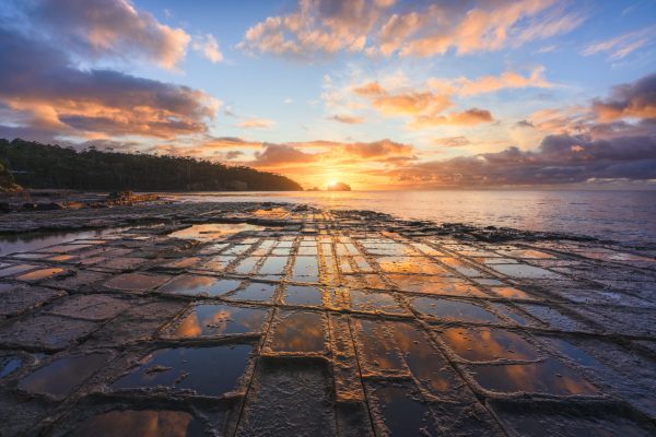 The most well known example of a tessellated pavement is the Tessellated Pavement that is found at Lufra, Teralina / Eaglehawk Neck on the Turrakana / Tasman Peninsula of Tasmania.
